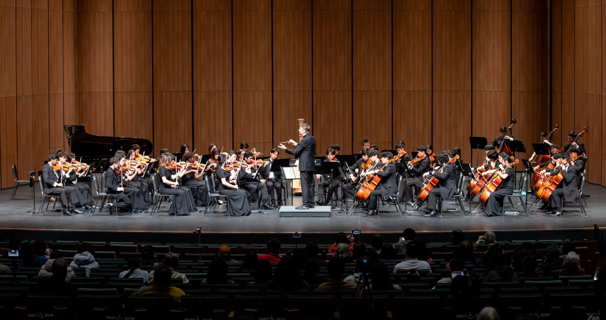 The Plano West Chamber Orchestra performing on stage